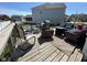 Outdoor wooden deck with comfortable patio furniture, perfect for relaxing and entertaining at 2068 Deer Valley Ct, Columbus, IN 47201