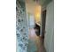 Bright bathroom with a single vanity and seashell-themed shower curtain, offering a fresh, coastal vibe at 2068 Deer Valley Ct, Columbus, IN 47201