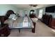 Large primary bedroom with elegant furnishings, carpet and natural light at 2068 Deer Valley Ct, Columbus, IN 47201