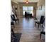 Spacious bonus room with hardwood floors, ideal for a home office, gym, or entertainment area at 2068 Deer Valley Ct, Columbus, IN 47201