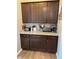 Functional kitchenette area with ample cabinet space and modern appliances on countertop at 2068 Deer Valley Ct, Columbus, IN 47201