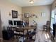 Comfortable home office setup, featuring a large desk, ample storage, and natural light at 2068 Deer Valley Ct, Columbus, IN 47201