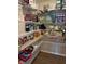 Organized walk-in pantry featuring wire shelving for ample storage of food items and appliances at 2068 Deer Valley Ct, Columbus, IN 47201