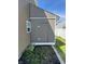 Durable shed with a slanted roof, enhancing storage and functionality within the fenced backyard at 2068 Deer Valley Ct, Columbus, IN 47201