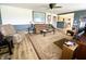 Cozy living room showcasing a comfortable sofa, area rug, and an open layout to the kitchen at 223 E 53Rd St, Anderson, IN 46013