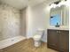 Bathroom featuring a new tiled shower and a modern vanity at 3019 Knobstone Ln, Indianapolis, IN 46203