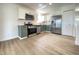 Modern kitchen featuring white cabinets and stainless steel appliances at 3019 Knobstone Ln, Indianapolis, IN 46203