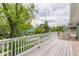 Spacious deck overlooking neighborhood offers a serene spot with chairs for relaxation at 328 N Layman Ave, Indianapolis, IN 46219