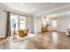 Inviting living room offers hardwood floors, neutral colors, and a cozy seating area at 328 N Layman Ave, Indianapolis, IN 46219