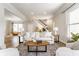 Spacious living room with hardwood floors and recessed lighting at 328 N Layman Ave, Indianapolis, IN 46219