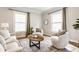 Cozy living room featuring natural light and stylish decor at 328 N Layman Ave, Indianapolis, IN 46219