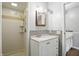 Updated bathroom featuring a stand-up shower and a vanity with stylish backsplash at 4044 Roamin Dr, Greenwood, IN 46142