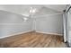 Spacious bedroom features vaulted ceilings, updated flooring and sliding glass doors at 4044 Roamin Dr, Greenwood, IN 46142