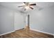 Bedroom featuring hardwood floors, neutral walls, and closet at 4044 Roamin Dr, Greenwood, IN 46142