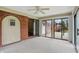 Enclosed sunroom with multiple glass sliding doors providing ample natural light at 4044 Roamin Dr, Greenwood, IN 46142