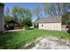 Large backyard with a gazebo covered hot tub, storage shed, and plenty of green space at 4257 Locust Ln, Brownsburg, IN 46112