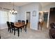 Bright dining room with chandelier and natural light, perfect for Gathering meals and gatherings at 4257 Locust Ln, Brownsburg, IN 46112