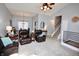 Open-concept living room with easy access to stairs, dining and comfortable seating at 4257 Locust Ln, Brownsburg, IN 46112