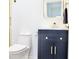 Modern bathroom showcases a vanity, toilet, and gold hardware at 474 N Randolph St, Indianapolis, IN 46201