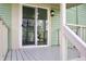 Back deck featuring sliding glass doors and light fixture at 474 N Randolph St, Indianapolis, IN 46201