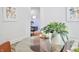 Bright dining area with glass table and seating, enhanced by neutral paint and decor at 474 N Randolph St, Indianapolis, IN 46201