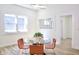 Bright dining area with glass table and chairs, offering a cozy space to gather at 474 N Randolph St, Indianapolis, IN 46201