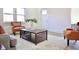 Well-lit living room showcases modern furniture and stylish decor on a cream-colored, patterned area rug at 474 N Randolph St, Indianapolis, IN 46201