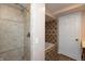 Tiled shower with both a shower head and a bath faucet, perfect for your bathing preferences at 480 E Walnut St, Martinsville, IN 46151