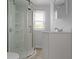 Bathroom featuring a white shower, sink and vanity with tiled floors at 524 S State St, Greenfield, IN 46140