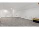 Large bonus room with neutral carpet, white walls, and ample space for activities and storage at 5423 Maywood Dr, Whitestown, IN 46075