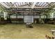 Spacious barn interior features a high ceiling with exposed wooden beams at 5707 S Burlington Dr, Muncie, IN 47302