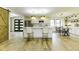 Bright and spacious kitchen featuring a large island, stainless steel appliances, and modern finishes at 5707 S Burlington Dr, Muncie, IN 47302