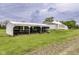 Diverse agricultural outbuildings offer functional space and storage, set amidst a sprawling green landscape at 5707 S Burlington Dr, Muncie, IN 47302
