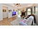 Well-lit living room offering a welcoming ambiance and access to the outdoors at 5809 Scotland St, Indianapolis, IN 46234