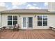 Wooden deck with outdoor seating, ideal for relaxation and enjoying the natural surroundings at 5864 Mustang Ter, Plainfield, IN 46168