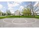 Outdoor basketball court providing recreational opportunities with surrounding green spaces for residents to enjoy at 5864 Mustang Ter, Plainfield, IN 46168