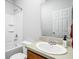 Cozy bathroom featuring a tub and shower combination, a neutral vanity, and a bright mirror at 5864 Mustang Ter, Plainfield, IN 46168