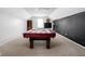 Spacious game room with a covered pool table, chalkboard wall, and recessed lighting at 5864 Mustang Ter, Plainfield, IN 46168