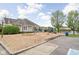 Community playground with swings and slide offers a delightful outdoor space for recreation and play at 5864 Mustang Ter, Plainfield, IN 46168