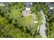 Aerial view of a property with expansive lawn and mature trees, providing privacy at 5925 Silas Moffitt Way, Carmel, IN 46033