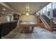 Spacious basement rec room features a pool table and bar area with tiled floors at 5925 Silas Moffitt Way, Carmel, IN 46033