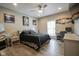 Bedroom with wood floors, ceiling fan and desk area at 5925 Silas Moffitt Way, Carmel, IN 46033