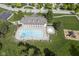 Community pool with jacuzzi and pool house set on a well-manicured lawn at 5925 Silas Moffitt Way, Carmel, IN 46033