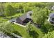 Charming brick home with a lush lawn, mature trees, and a welcoming entrance at 5925 Silas Moffitt Way, Carmel, IN 46033