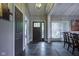 Foyer with tiled floors, transom window, and gray walls at 5925 Silas Moffitt Way, Carmel, IN 46033