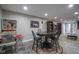 Basement game room with a pinball machine, card table, and other forms of entertainment at 5925 Silas Moffitt Way, Carmel, IN 46033
