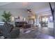 Spacious living room with vaulted ceilings, comfortable seating, and an open layout at 5925 Silas Moffitt Way, Carmel, IN 46033