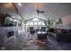 Inviting living room with a fireplace, vaulted ceilings, and ample natural light at 5925 Silas Moffitt Way, Carmel, IN 46033