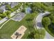 Tennis and basketball courts with a playground in a well-maintained community at 5925 Silas Moffitt Way, Carmel, IN 46033