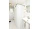 Bathroom featuring a white sink, tile flooring, and a shower with curtain at 6167 Ralston Ave, Indianapolis, IN 46220